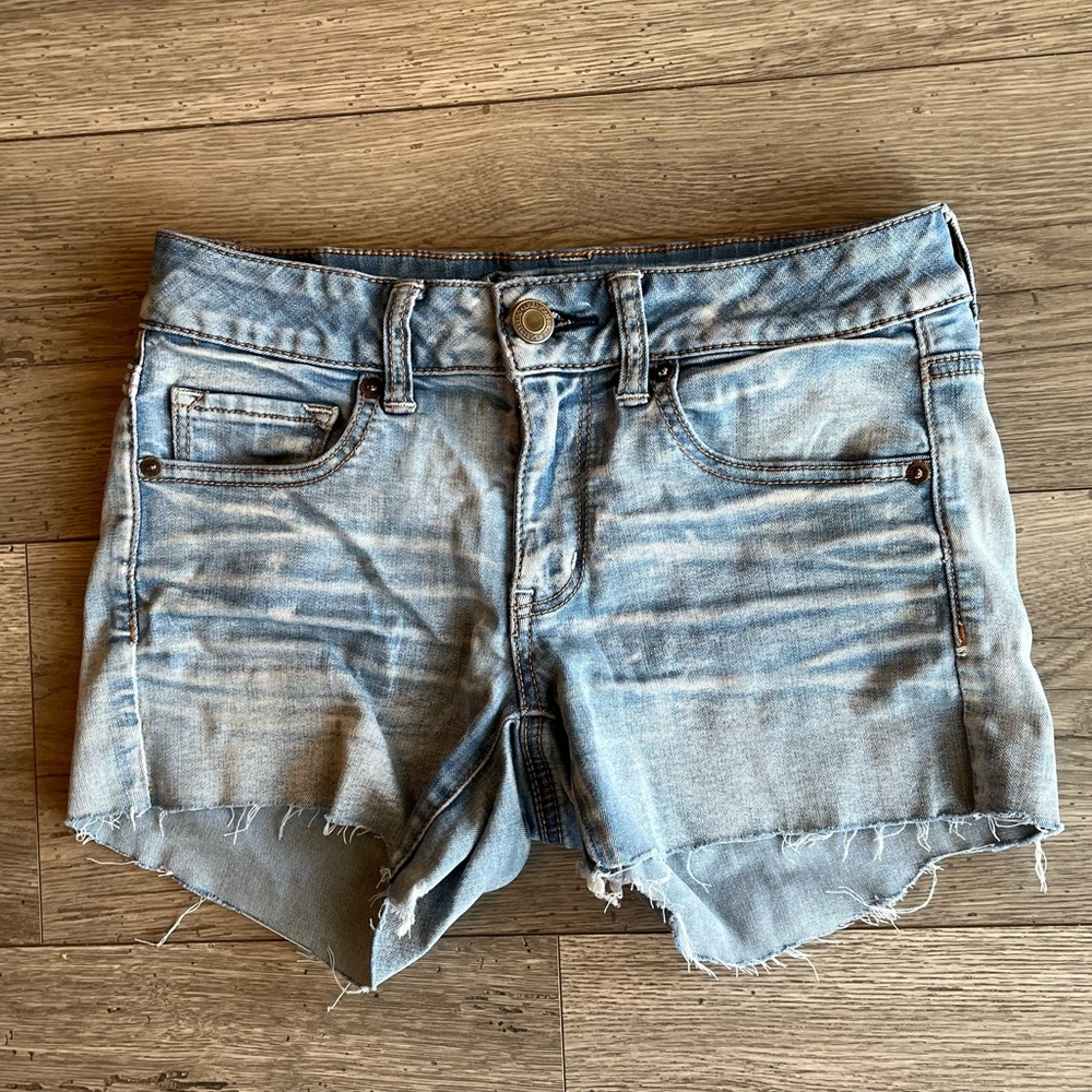 American Eagle Super Super Stretch Midi Distressed Light Wash Denim Jean Shorts